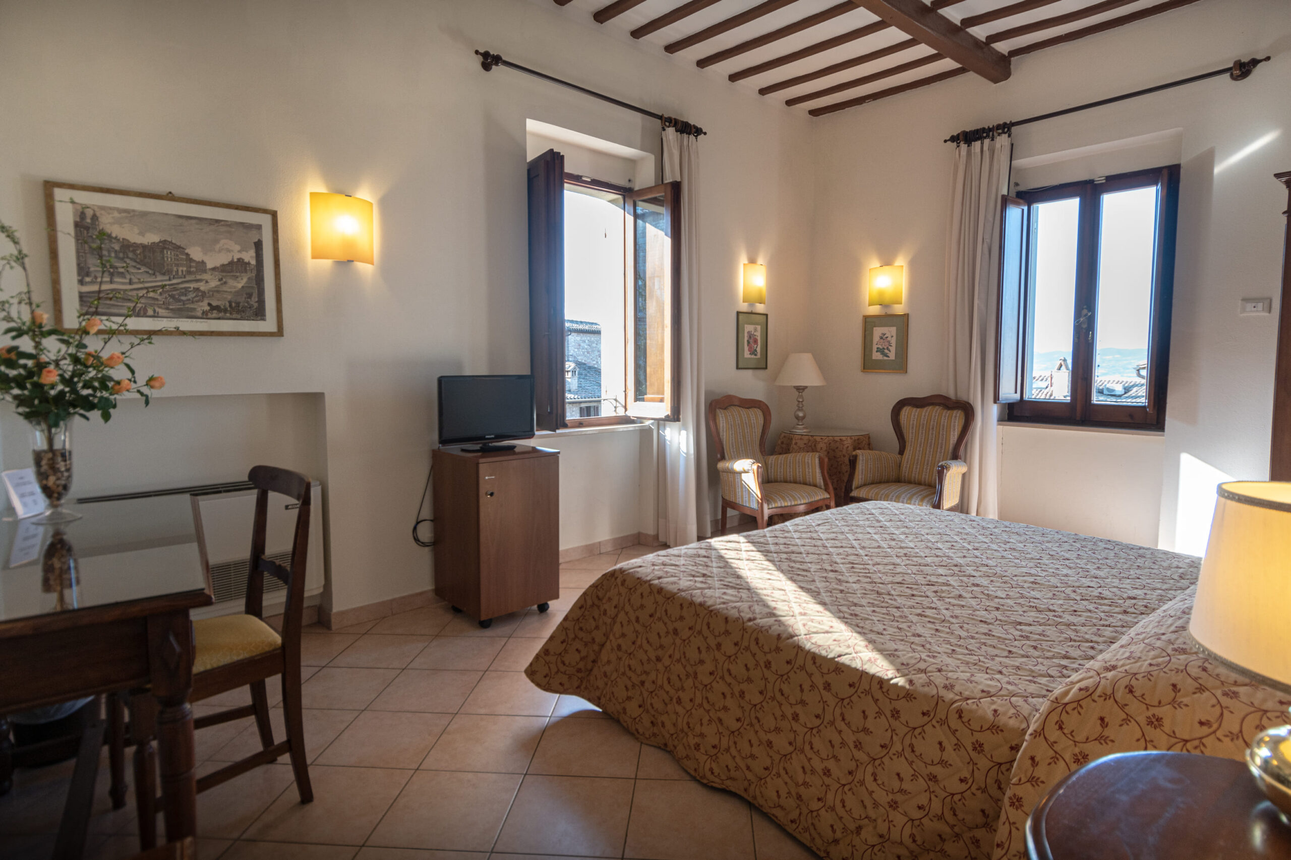 Camera doppia standard con soffitto in legno | Hotel Umbra | Hotel tre stelle nel centro storico di Assisi